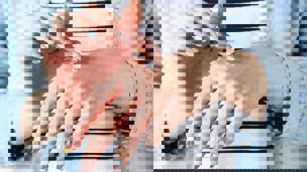 Female Hands Applying Hand Cream