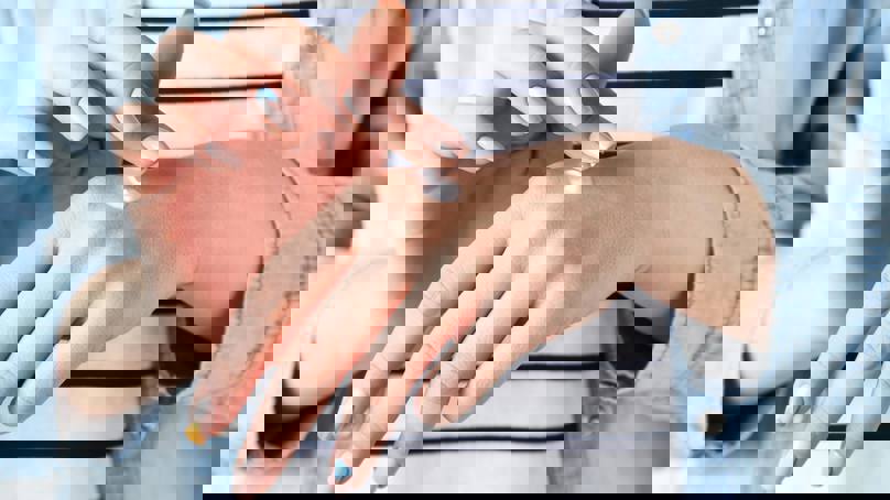 Female Hands Applying Hand Cream