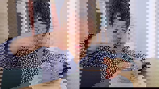 Child Eating Cereal
