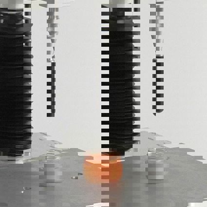 Hemispherical Probe attached to Texture Analyser testing cosmetic product