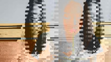 Person eating noodles