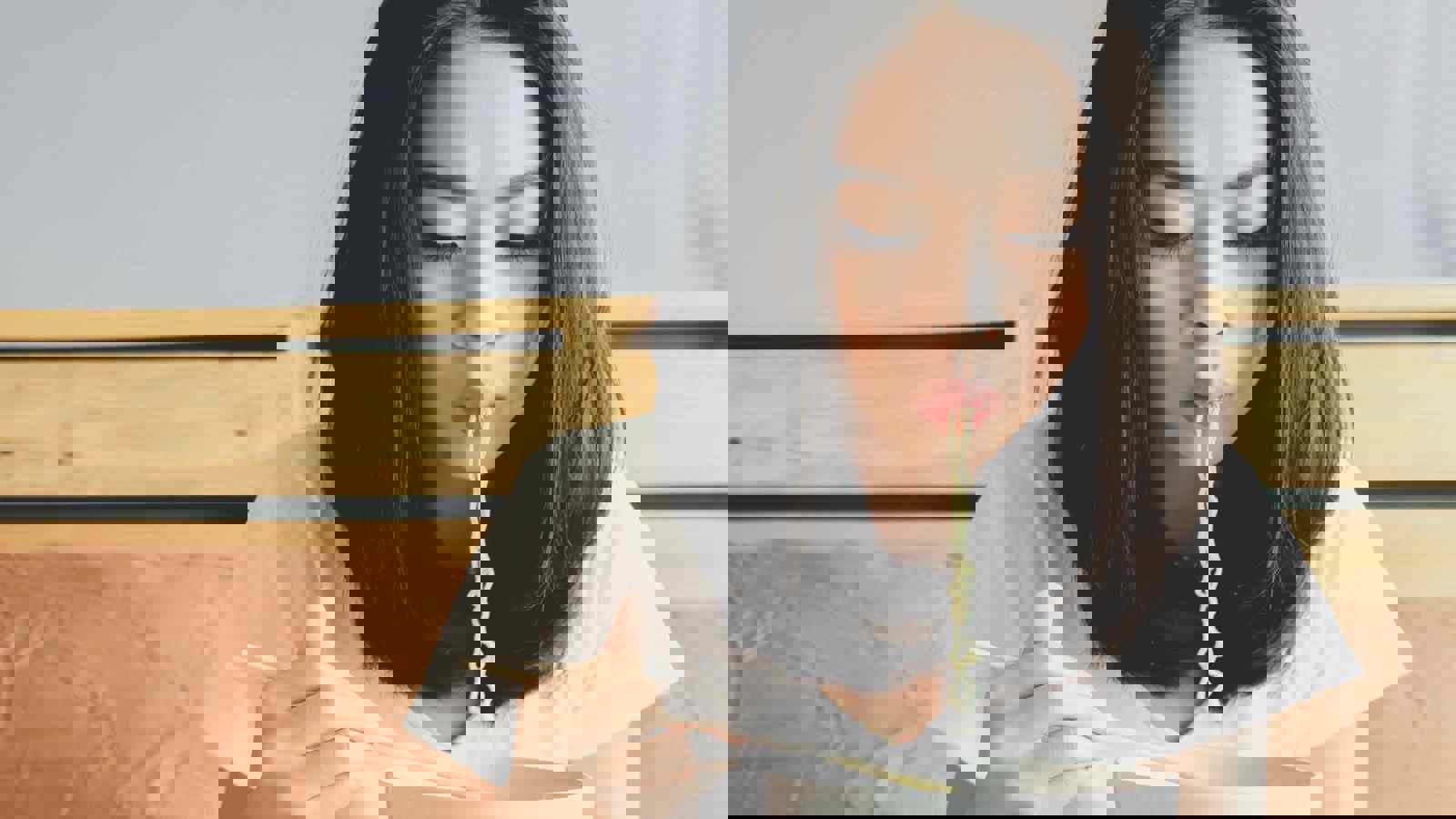 Person eating noodles