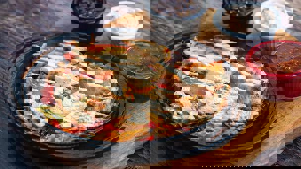 Plate Of Chicken Strips And Condiments