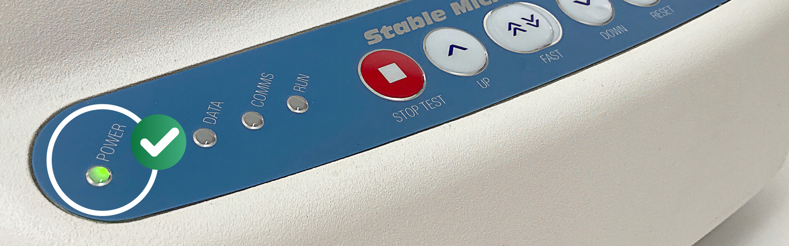 Front keypad of a Texture Analyser with the power light illuminated