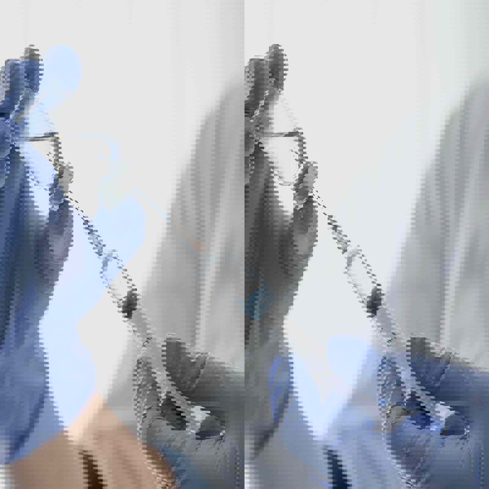 Doctor drawing medicine into a syringe