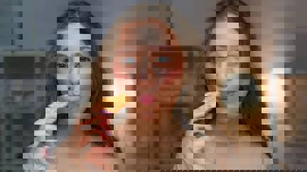 Woman Biting Into Cracker