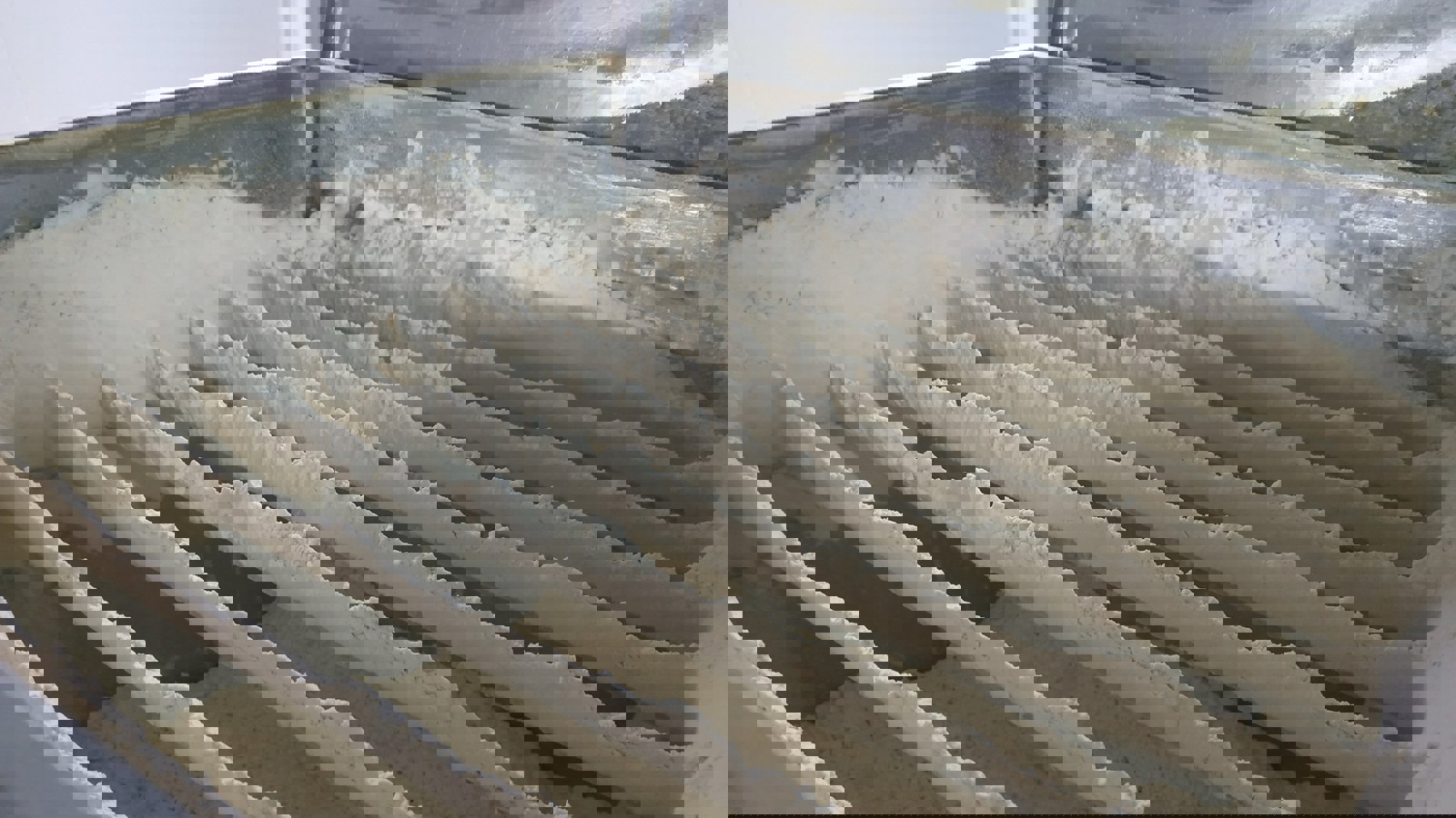 Caked powder in factory production