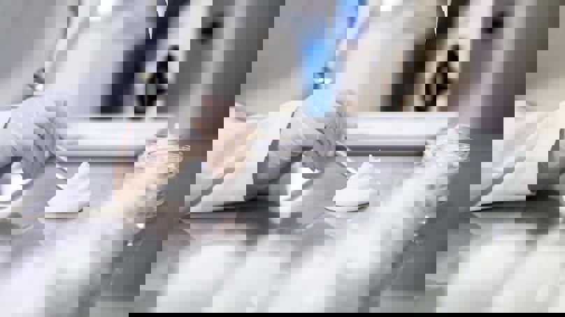 Scientist Formulating Skin Cream In A Lab