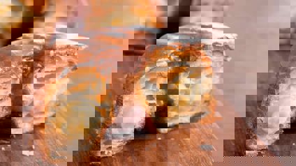 Custard Filled Cronut Cut In Half