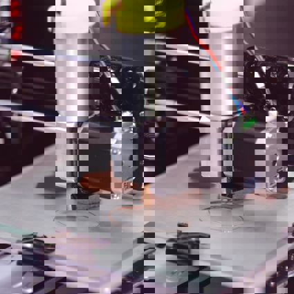 3D printer printing discs of chocolate