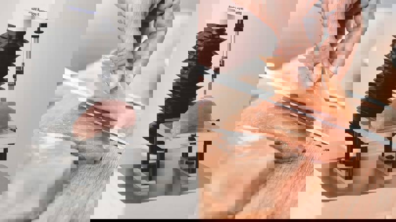 Image Pairing A MORS Meullenet Owens Razor Shear Blade And Slicing Raw Chicken Breast