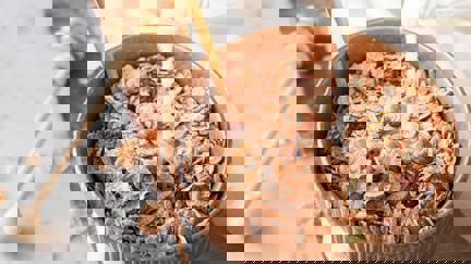 Milk Pouring Into Bowl Of Museli